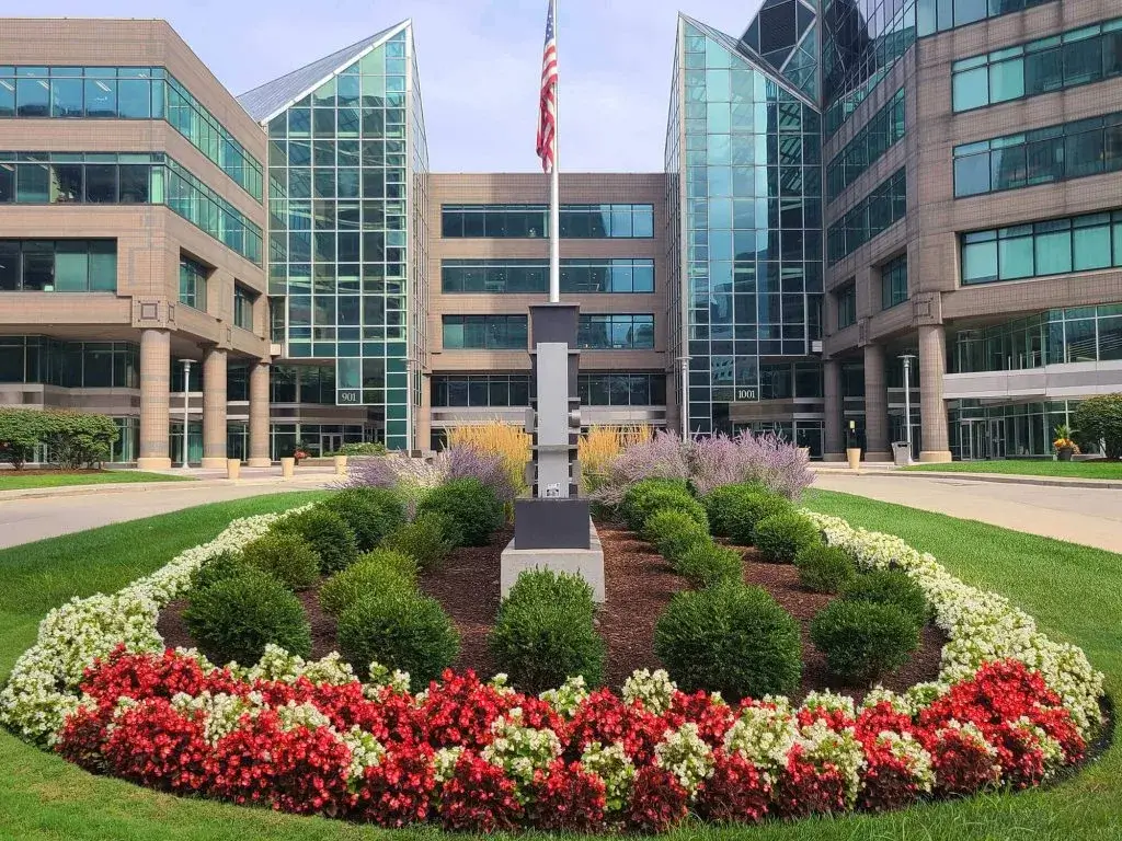 Flowerbed and Shrub Feature around a Flag Pole